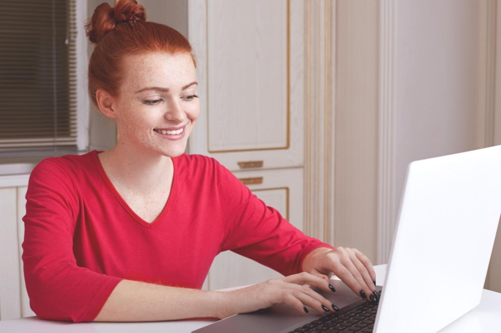 Financial analyst reviewing cost management data on computer screens